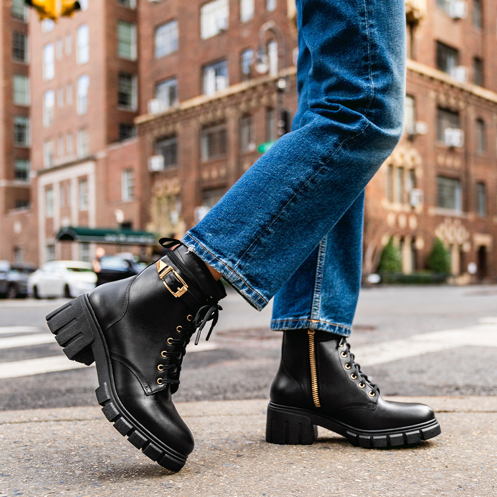 Edgy Detail: Black Combat Boots with Buckle and Denim — Timberland Boots Outfits