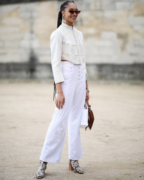 White Cropped Jacket Over Long-Sleeve Top and Wide-Leg Jeans — Winter White Outfits