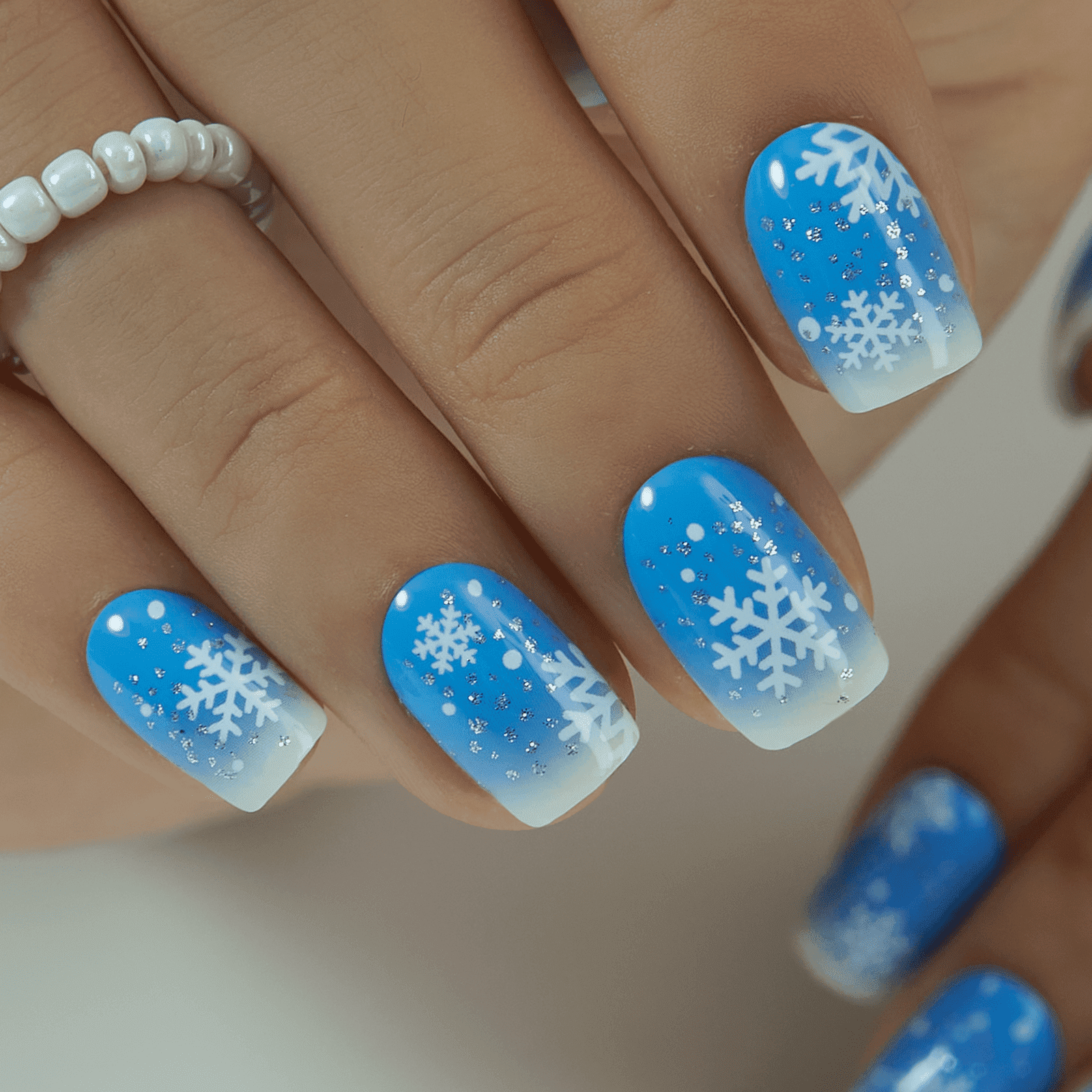Blue Ombre Snowflake Glitter Squovals Blue Ombre Snowflake Glitter Squovals — Winter Squoval Nails