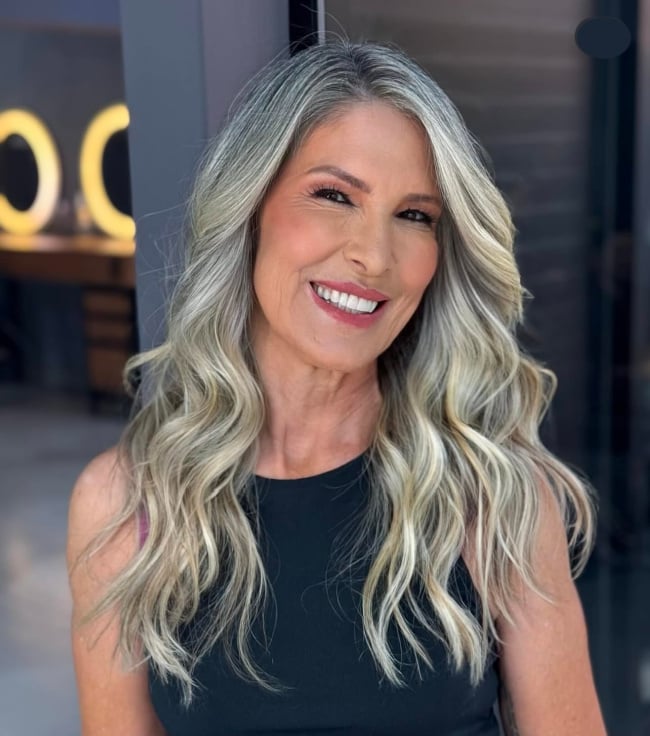 Voluminous Ash Blonde Curls Voluminous Ash Blonde Curls — Winter Haircuts for Women Over 40