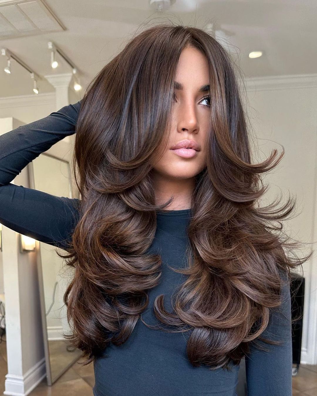 Voluminous Blowout With Deep Waves Voluminous Blowout With Deep Waves — Winter Haircuts for Wavy Hair