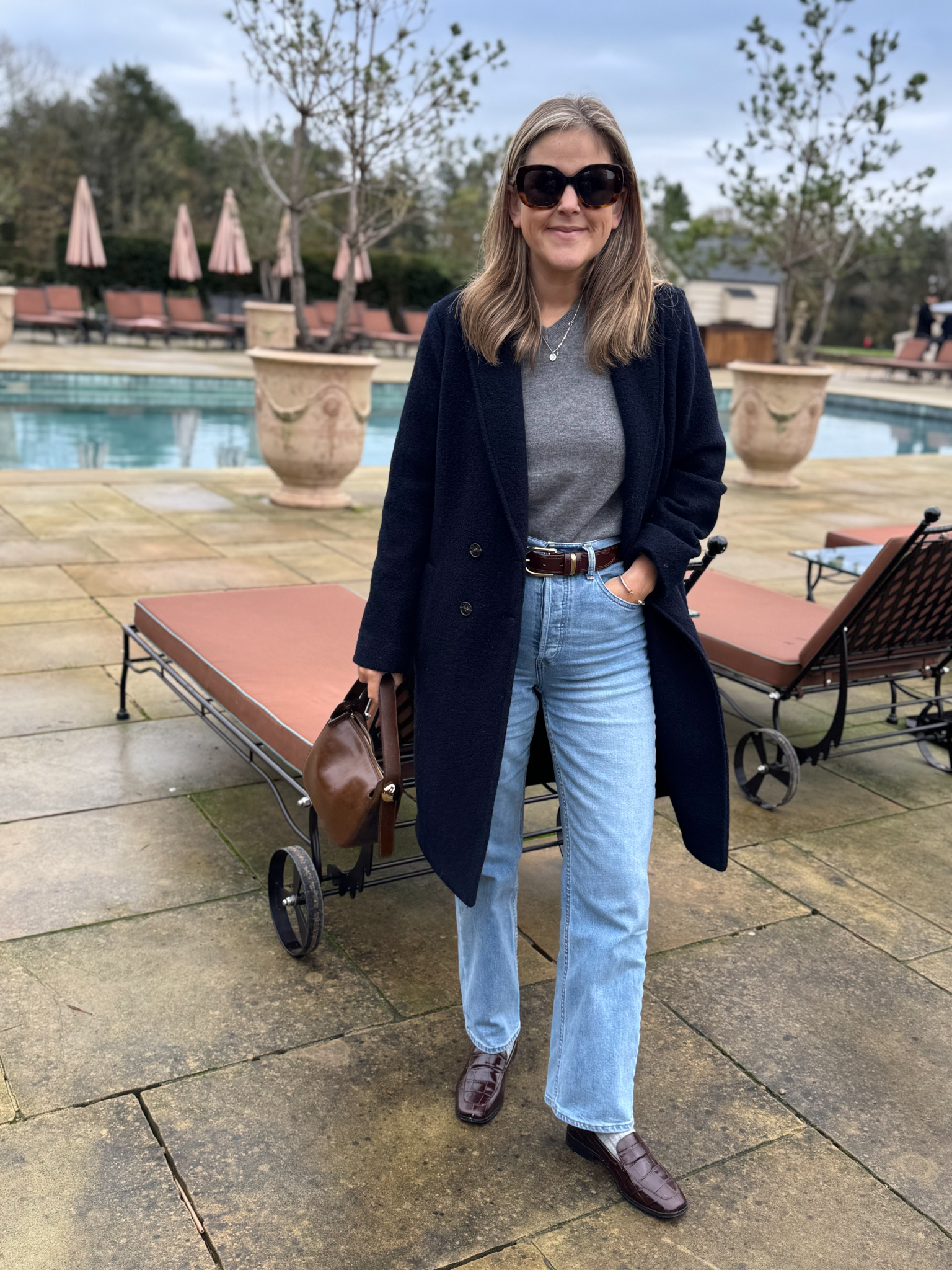 Navy Bouclé Coat Over Casual Jeans and Loafers — Late Winter Outfits