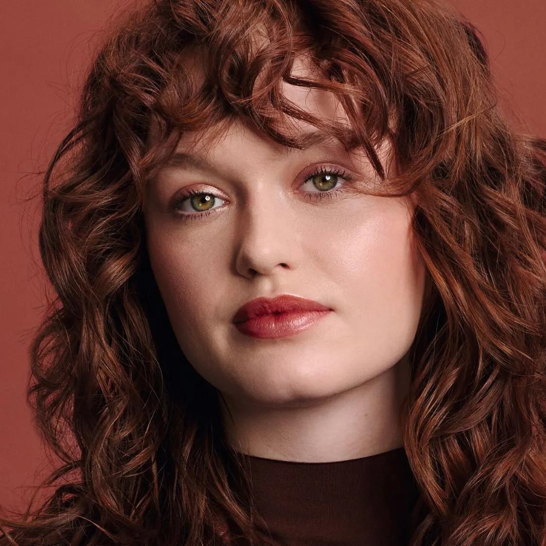 Warm Auburn With Wispy Bangs — Winter Hair Colors for Redheads