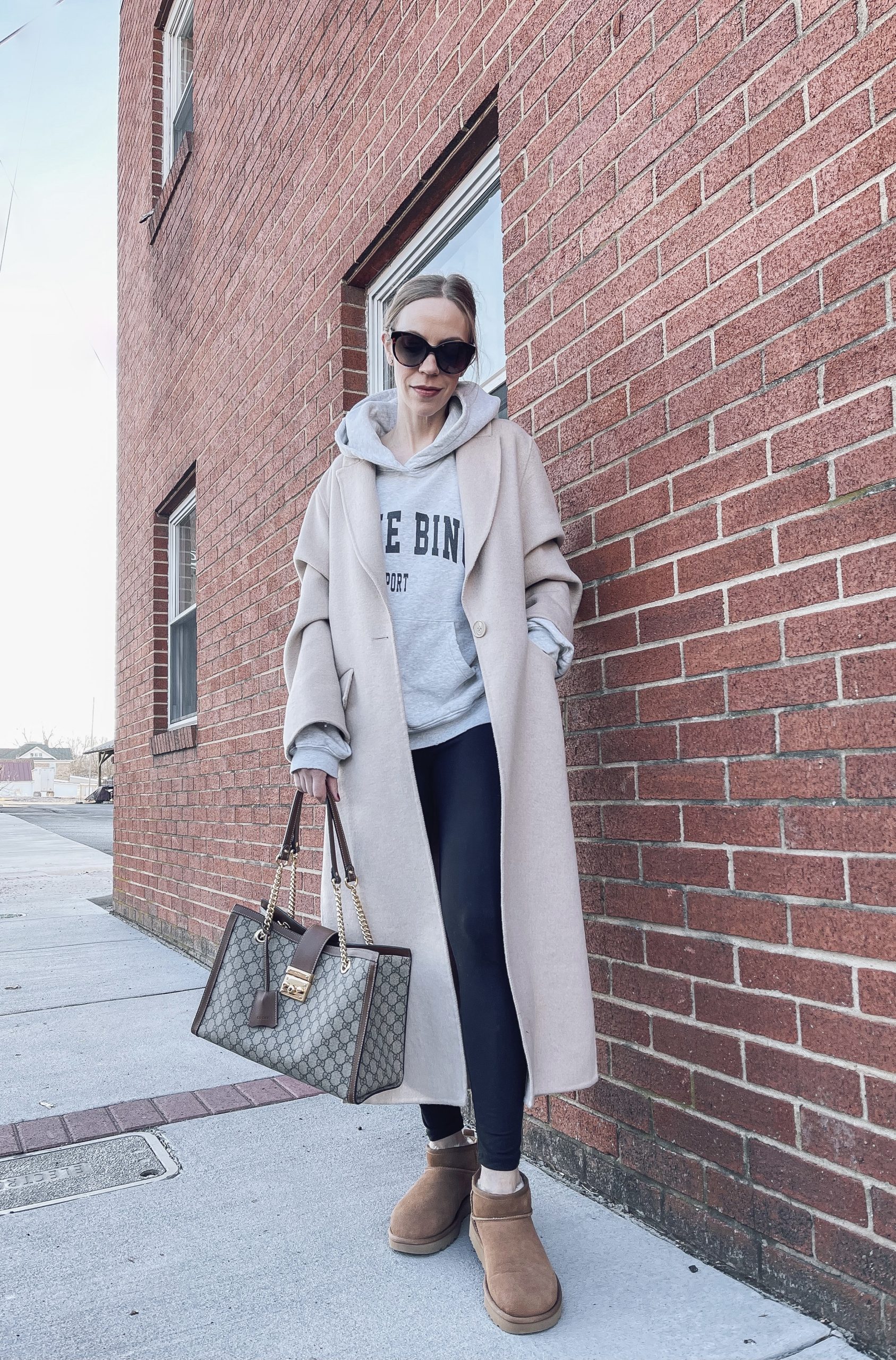Long Beige Coat and Graphic Hoodie with Tan Uggs Long Beige Coat and Graphic Hoodie with Tan Uggs — Ugg Boots Outfits