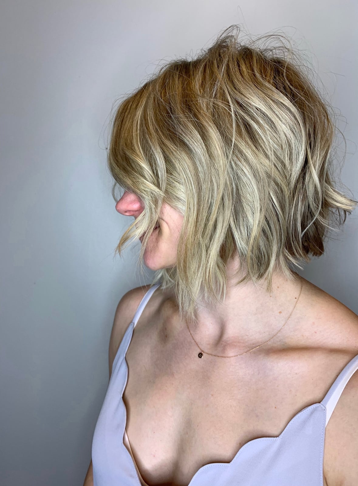 Ash Blonde Chin Length A-Line Bob With Waves, Side-Swept Ash Blonde Chin Length A-Line Bob With Waves, Side-Swept