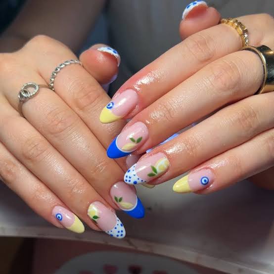 Almond Nails with Eye and Floral Designs Almond Nails with Eye and Floral Designs — Aesthetic Nails