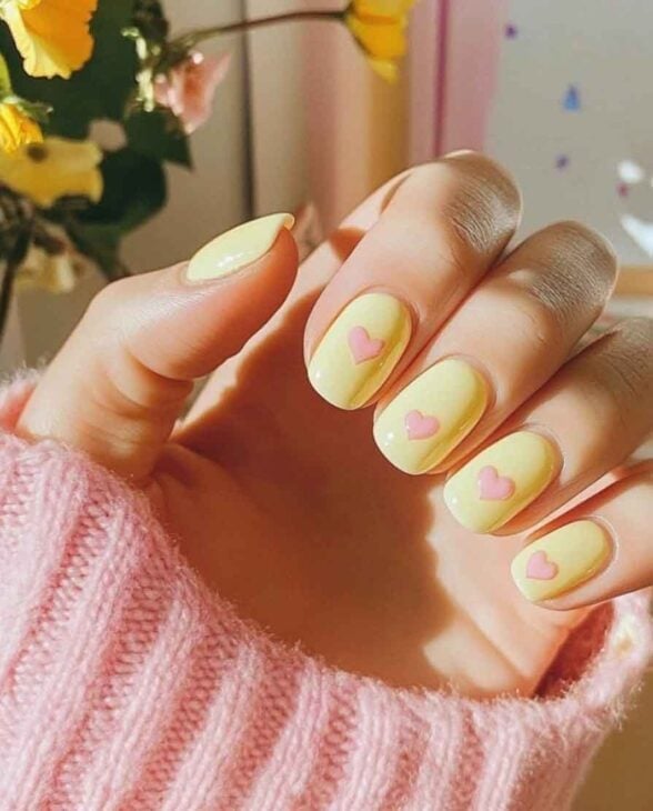Short Oval Pale Yellow Pink Heart Nails, Close-Up Take Short Oval Pale Yellow Pink Heart Nails, Close-Up Take — Aesthetic Nails
