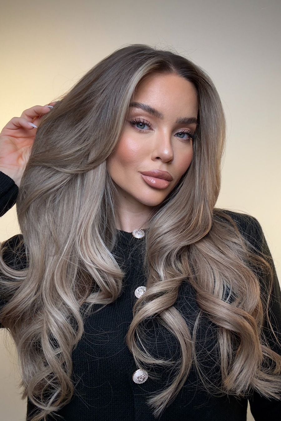 Mid-Back Length Ash Blonde With Balayage Layers
