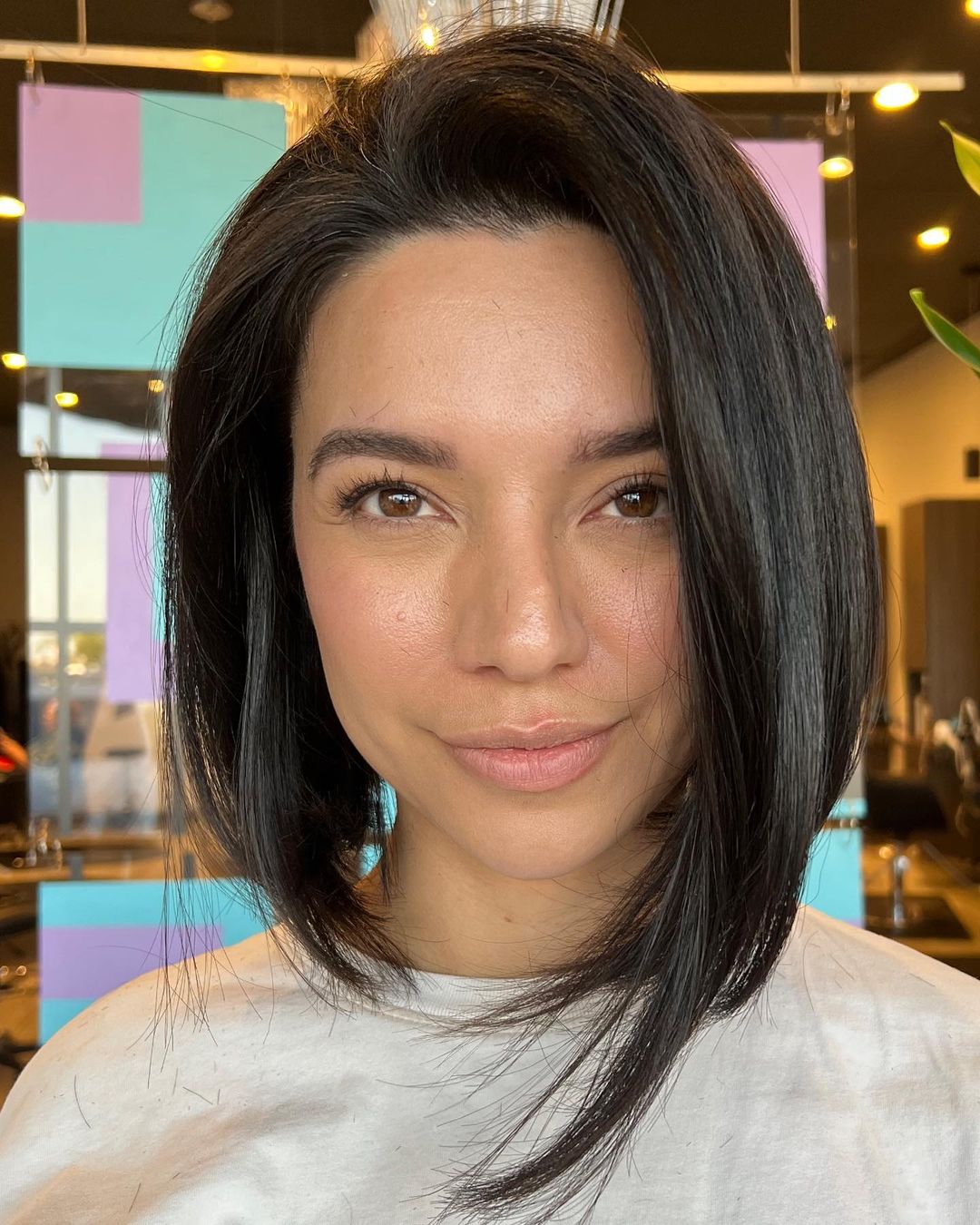 Collarbone Dark Brown Bob With Middle Part — Asymmetrical Bob