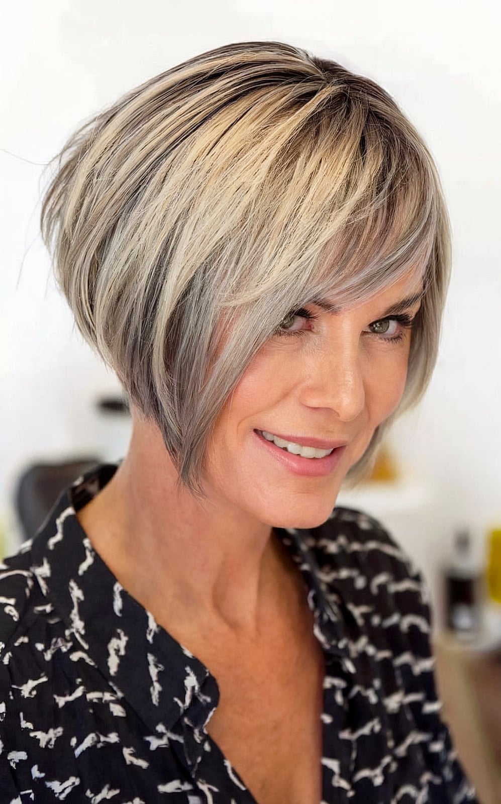 Wavy Ash Blonde Stacked Bob — Asymmetrical Bob