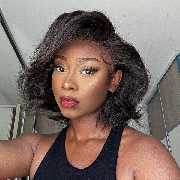 Thick Wavy Bob With Blonde Highlights — Asymmetrical Bob