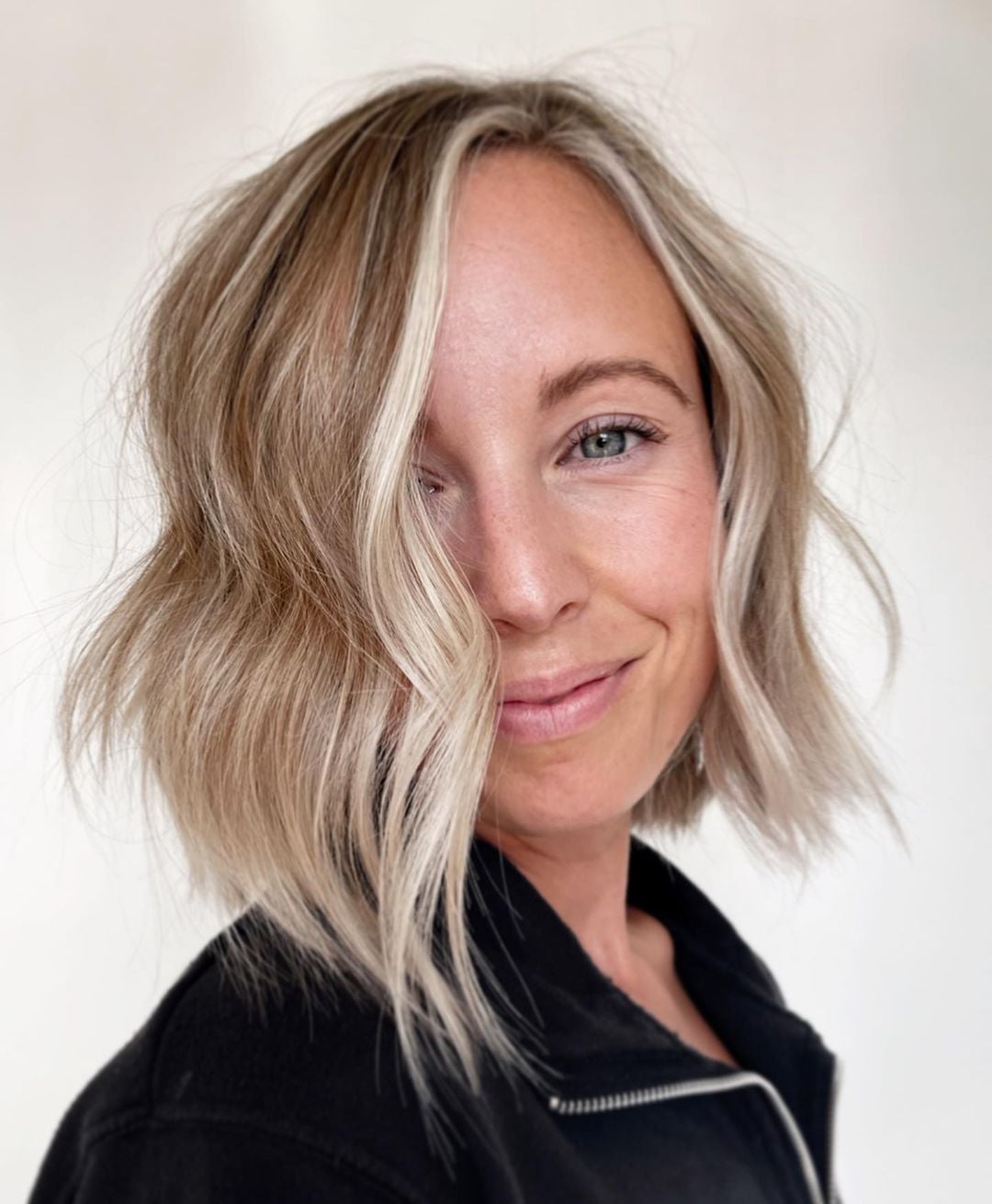 Collarbone Blonde Bob With Soft Waves — Asymmetrical Bob