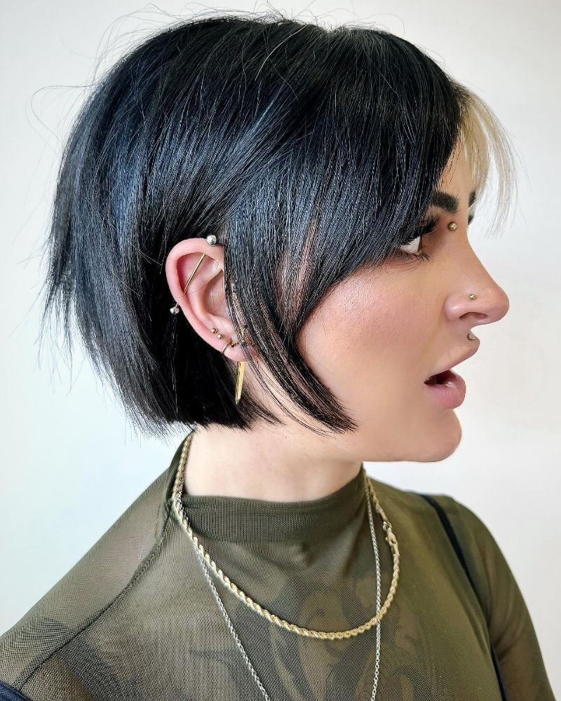 Black Asymmetrical Bob With Blonde Money Piece