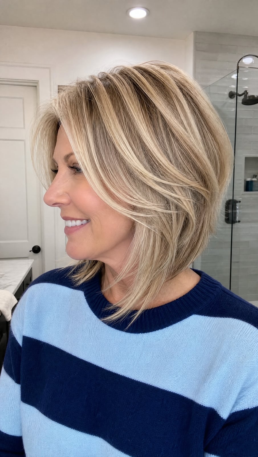 Layered Ash Blonde Bob With Curtain Bangs — Asymmetrical Bob