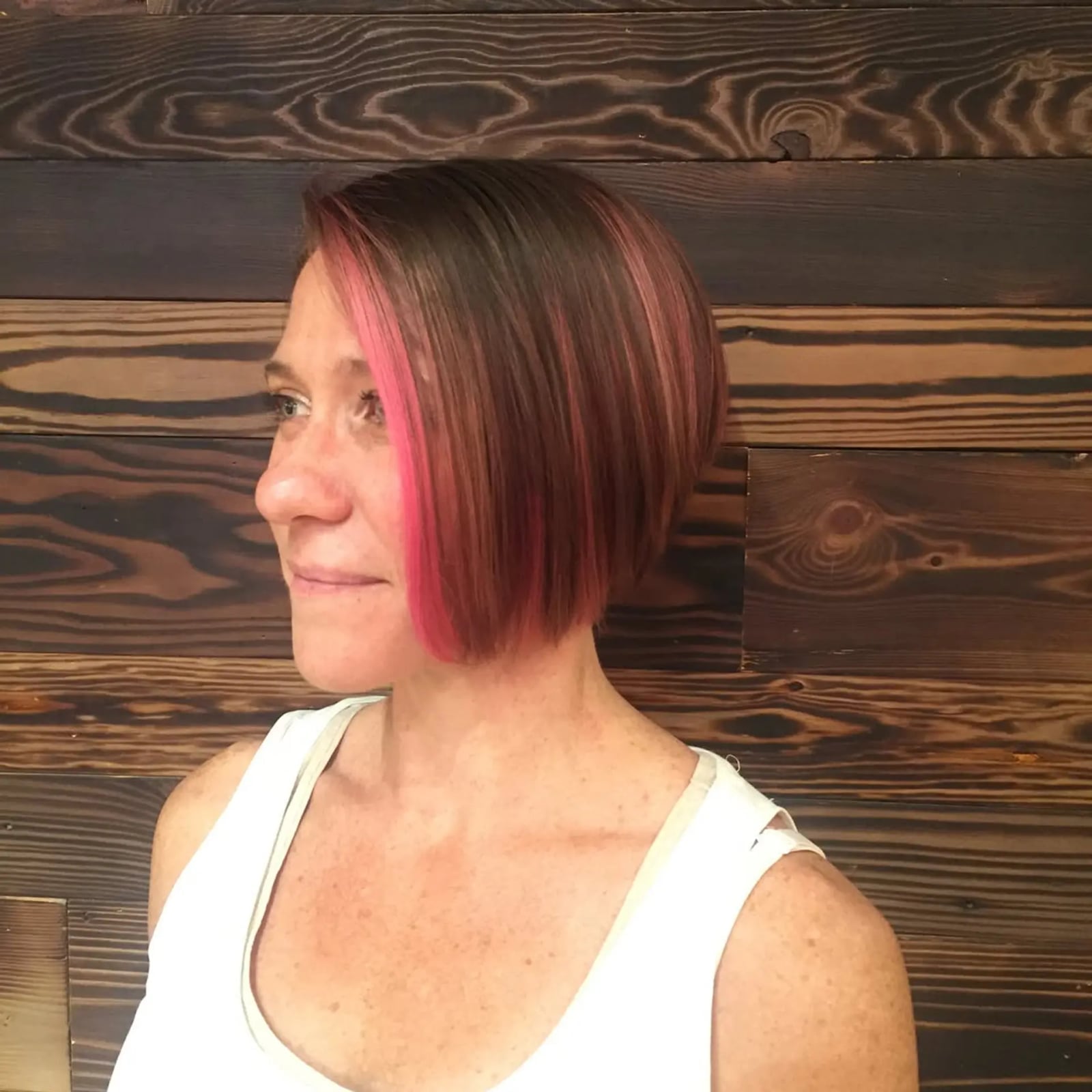 Edgy Brown Bob With Pink Highlights — Asymmetrical Bob