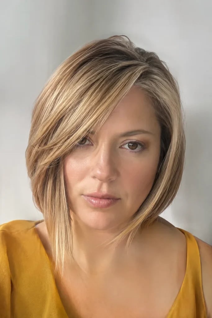 Honey Blonde Asymmetrical Lob With Blowout, Side Swept Bangs