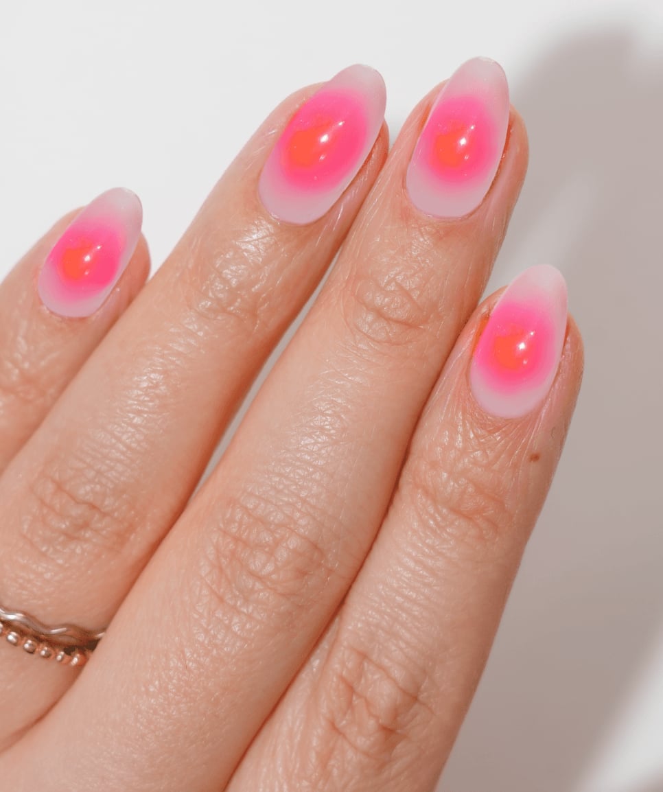 Neon Orange Aura on Sheer Pink Medium Oval Nails Neon Orange Aura on Sheer Pink Medium Oval Nails — Aura Nails