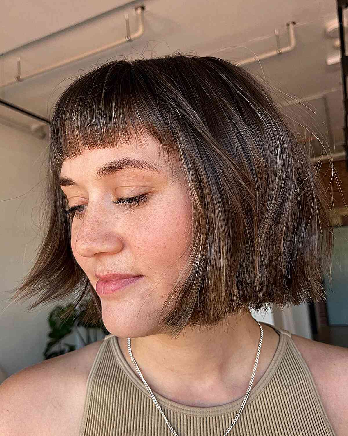 Chin Length Bob With Wispy Baby Bangs, Brown With Highlights