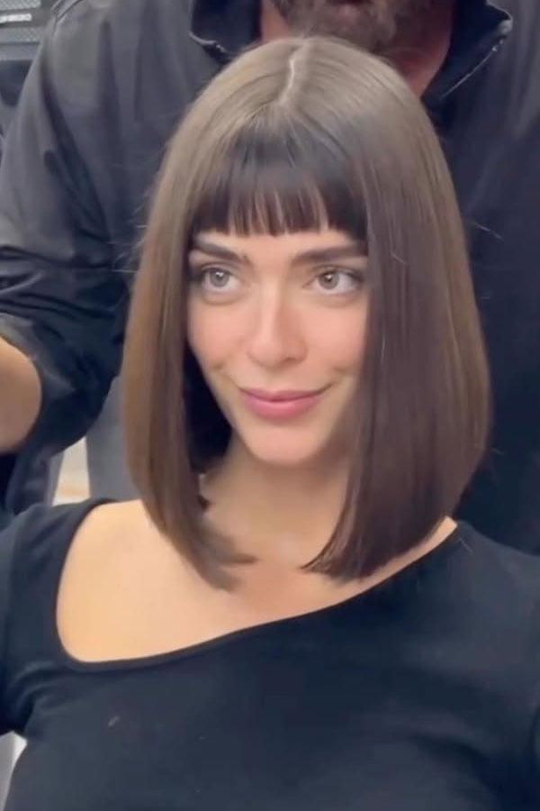 Dark Brown Sleek Bob With Sharp Baby Bangs
