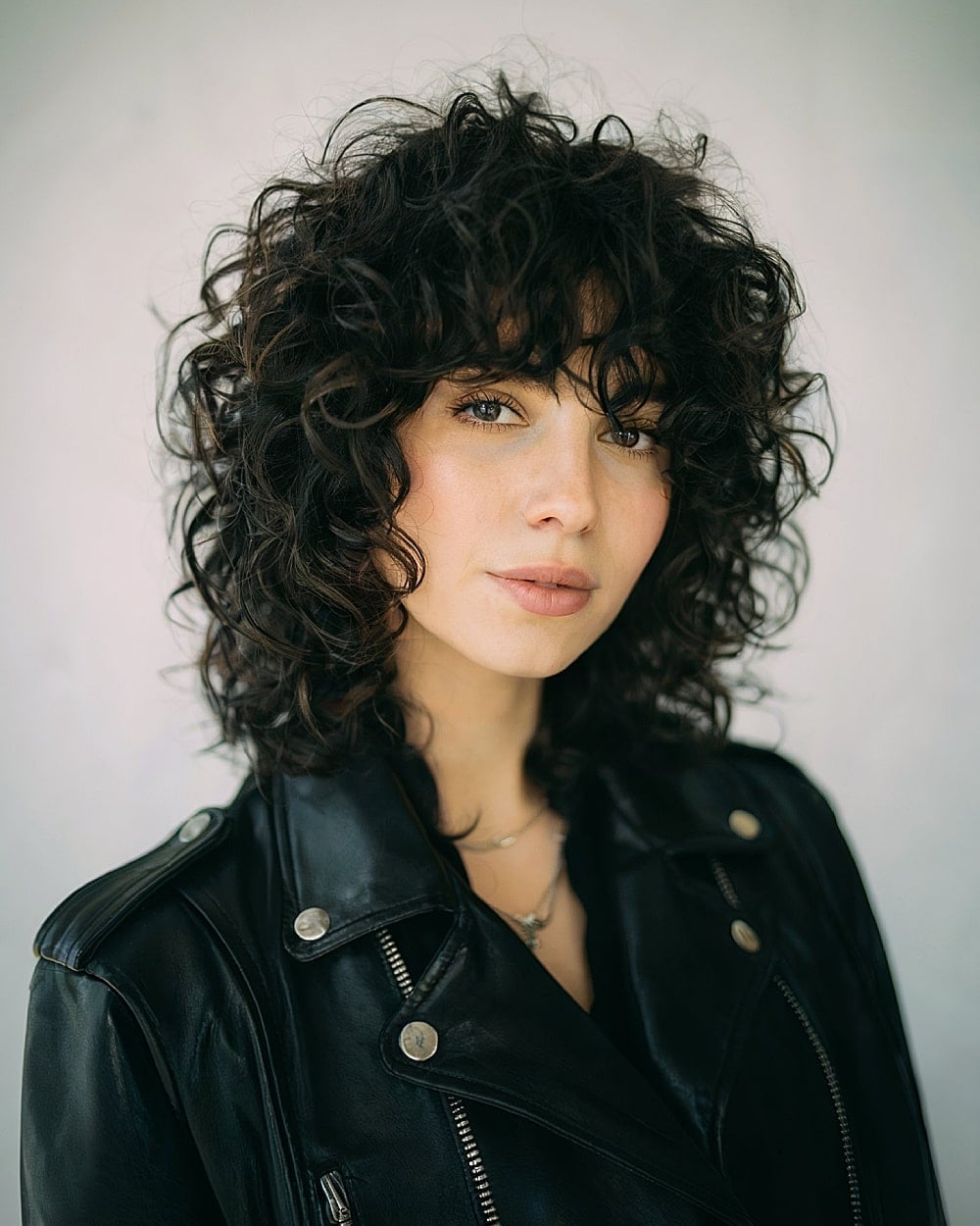 Shoulder Length Shag With Choppy Bangs — Bangs for Curly Hair