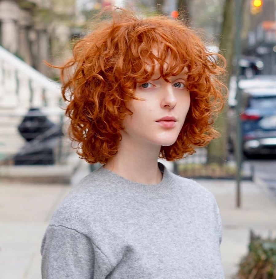 Fiery Red Shag With Collarbone Curly Bangs — Bangs for Curly Hair