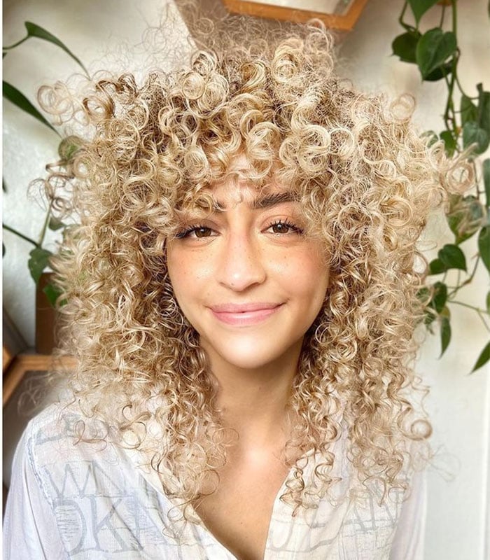 Shoulder Length Honey Blonde Curly Hair With Full Bangs — Bangs for Curly Hair