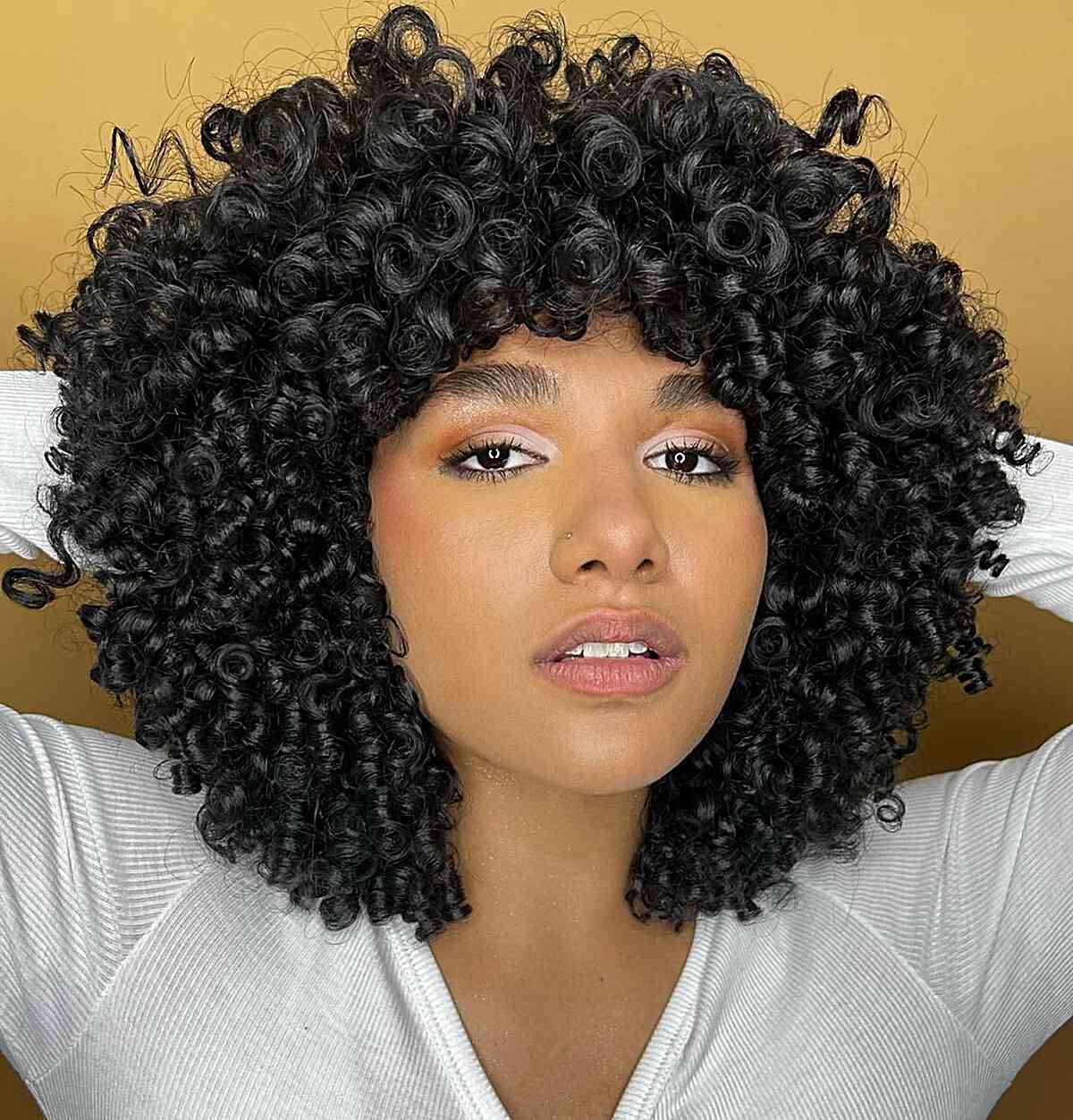 Voluminous Blonde Short Shag With Curly Bangs — Bangs for Curly Hair