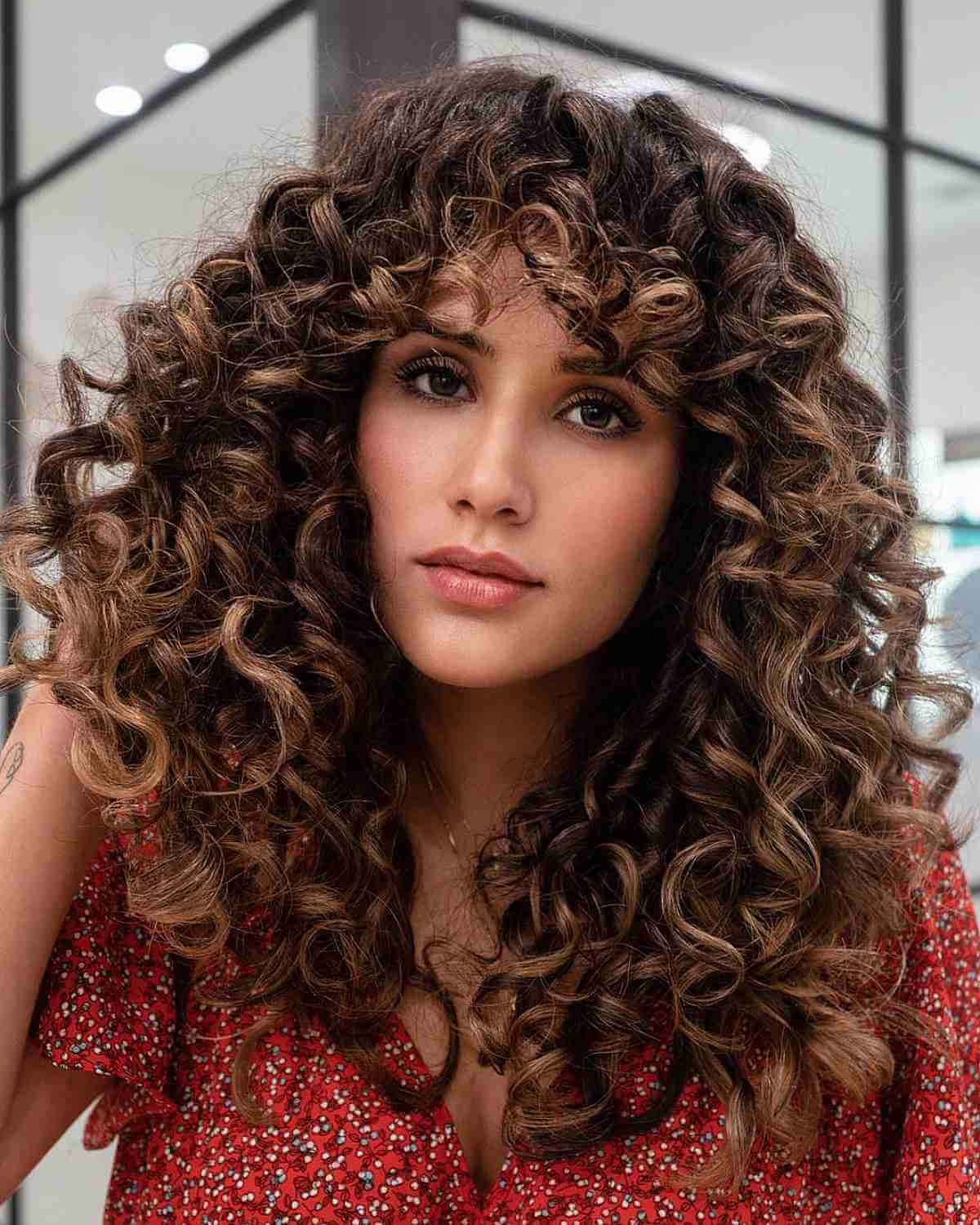 Mid-Back Curly Hair With Voluminous Bangs — Bangs for Curly Hair