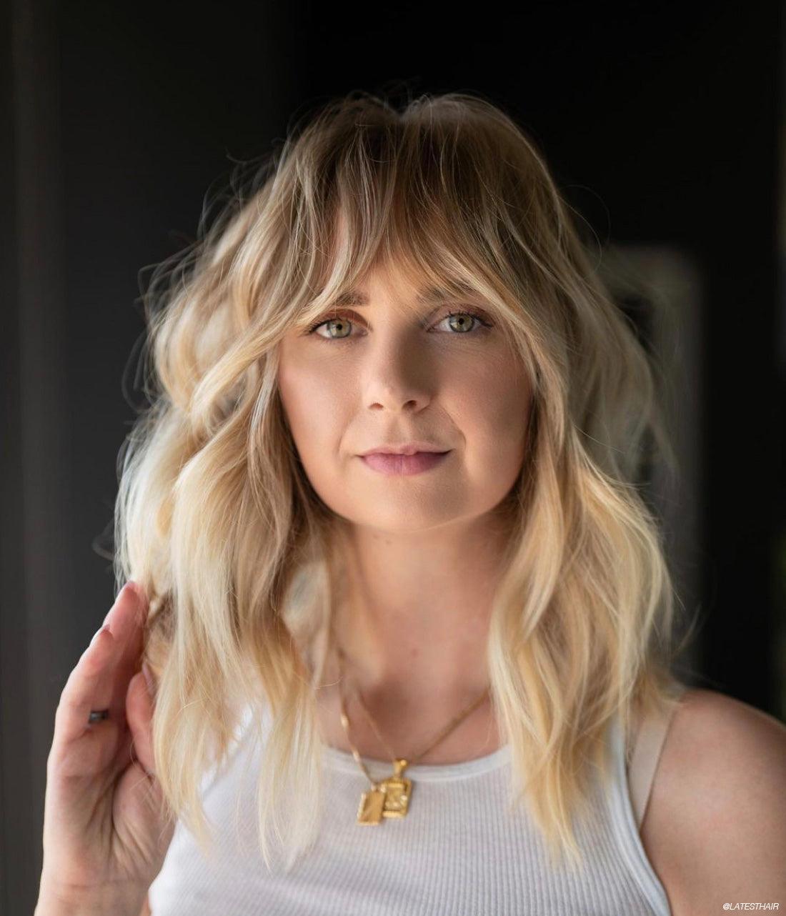Collarbone Layers With Wispy Face-Framing Bangs Collarbone Layers With Wispy Face-Framing Bangs — Bangs Trends