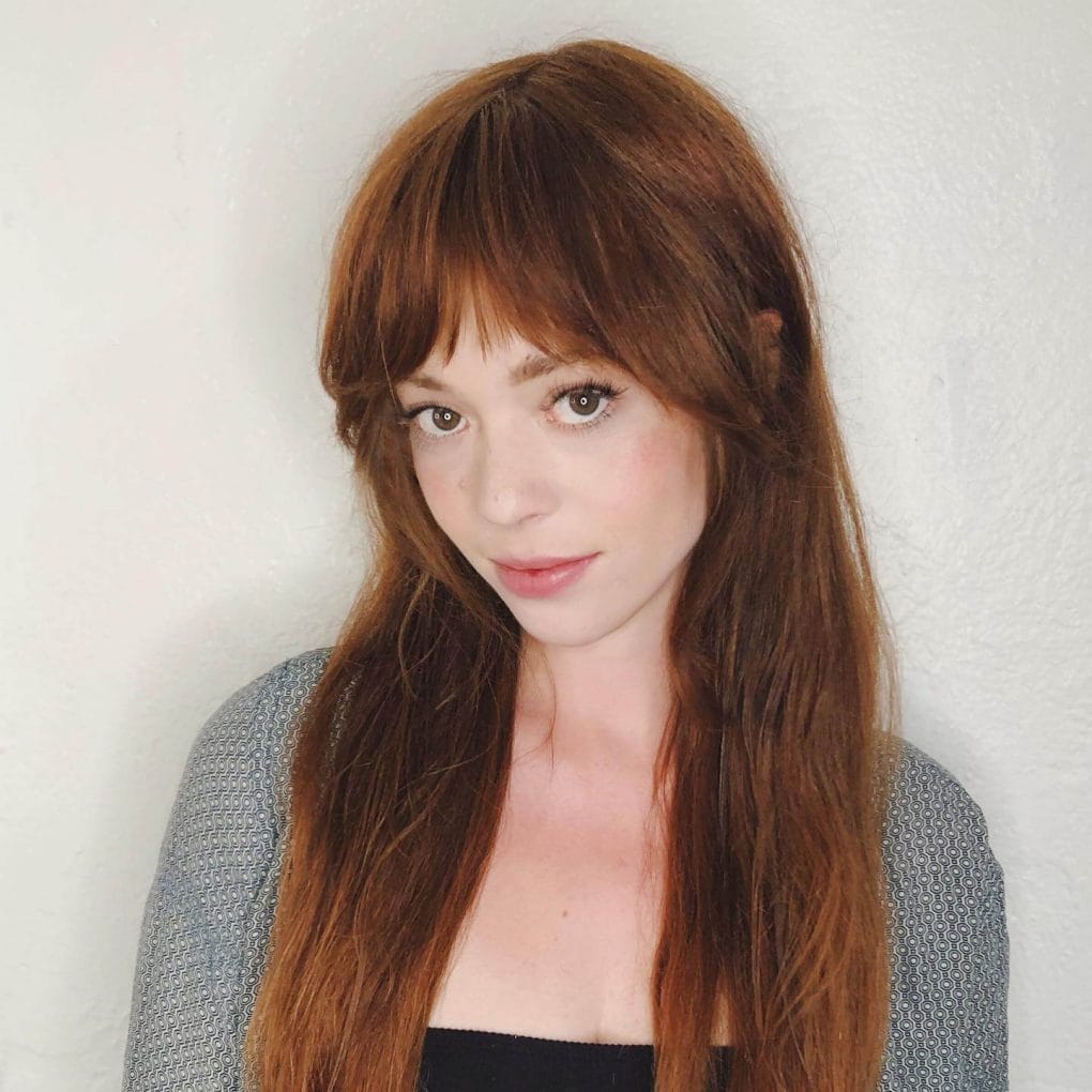 Medium Brown Collarbone Layers With Curtain Bangs, Close-Up Take — Bardot Bangs