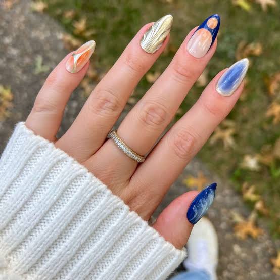 Long Almond Metallic Gold And Abstract Blue Art Nails — Birthday Nails Almond