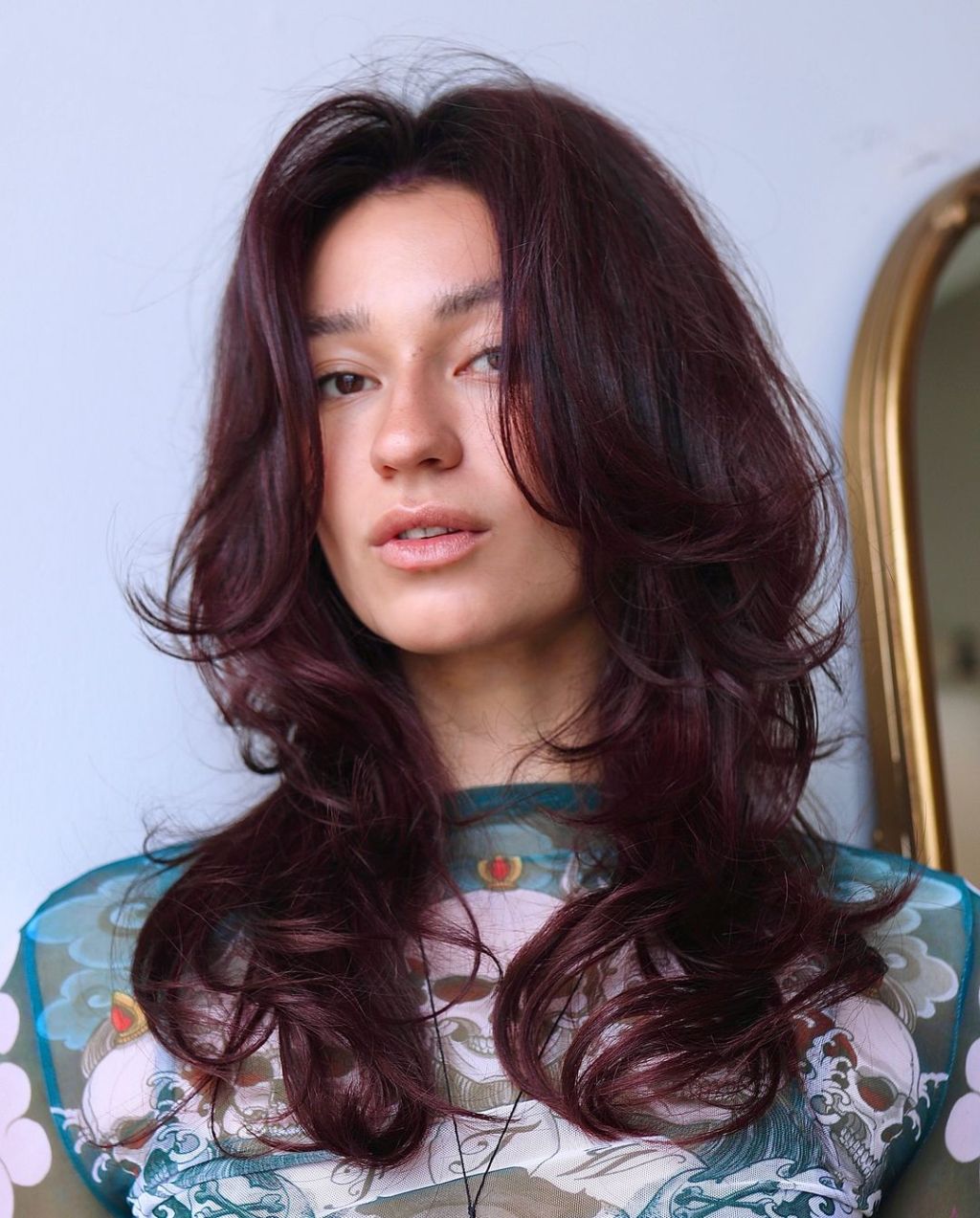 Collarbone Layered Cut With Curtain Bangs Collarbone Layered Cut With Curtain Bangs — Black Cherry Hair