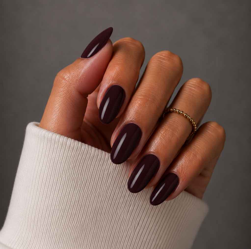 Medium Oval Deep Burgundy Glossy Nails, Close-Up Take — Black Cherry Nails