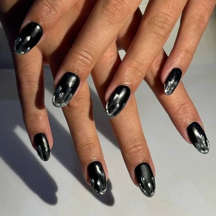 Short Oval Black Nails with Silver Chrome Drips Short Oval Black Nails with Silver Chrome Drips — Black Chrome Nails