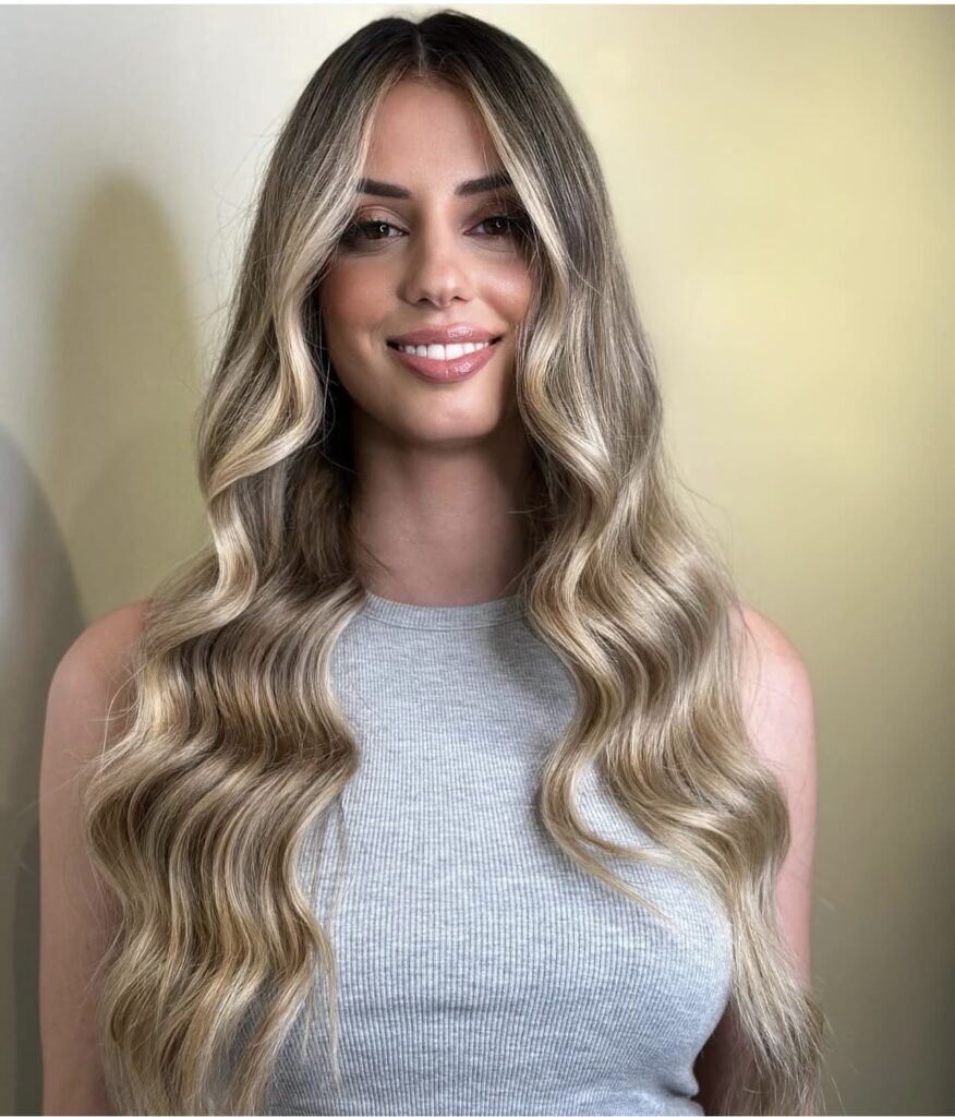 Mid-Back Dark Blonde Balayage With Curtain Bangs, Wavy Mid-Back Dark Blonde Balayage With Curtain Bangs, Wavy