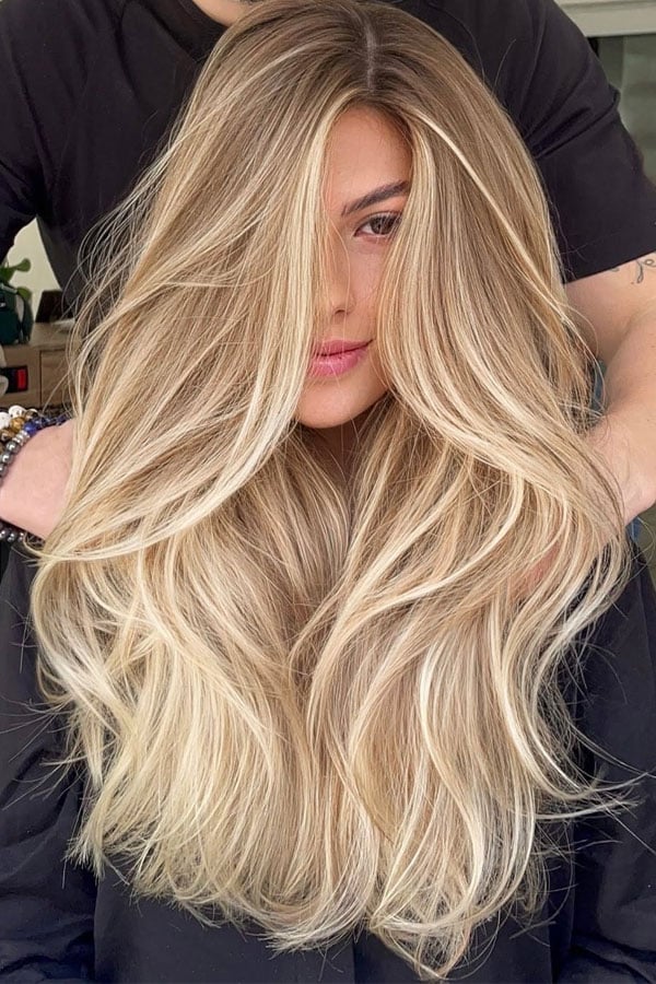 Mid-Back Butter Blonde Highlights With Curtain Bangs