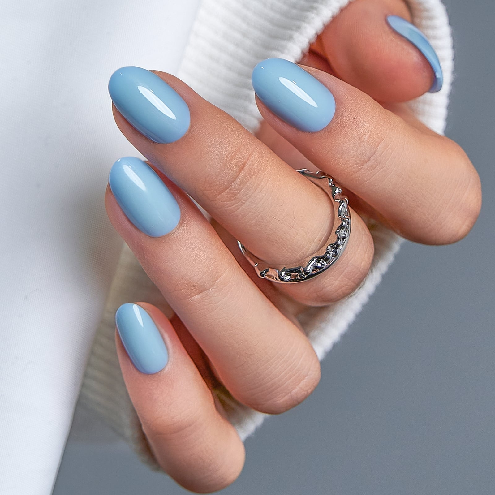 Milky Sky Blue Glossy Short Almond Nails — Blue Nails