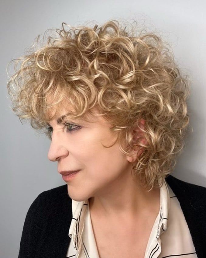 Ear To Chin Bob With Side Swept Bangs Ear To Chin Bob With Side Swept Bangs — Bob for Curly Hair