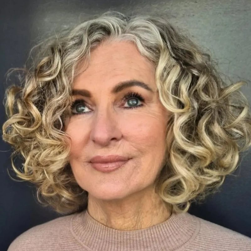 Chin Bob With Voluminous Curls and Curtain Bangs Chin Bob With Voluminous Curls and Curtain Bangs — Bob for Women Over 60