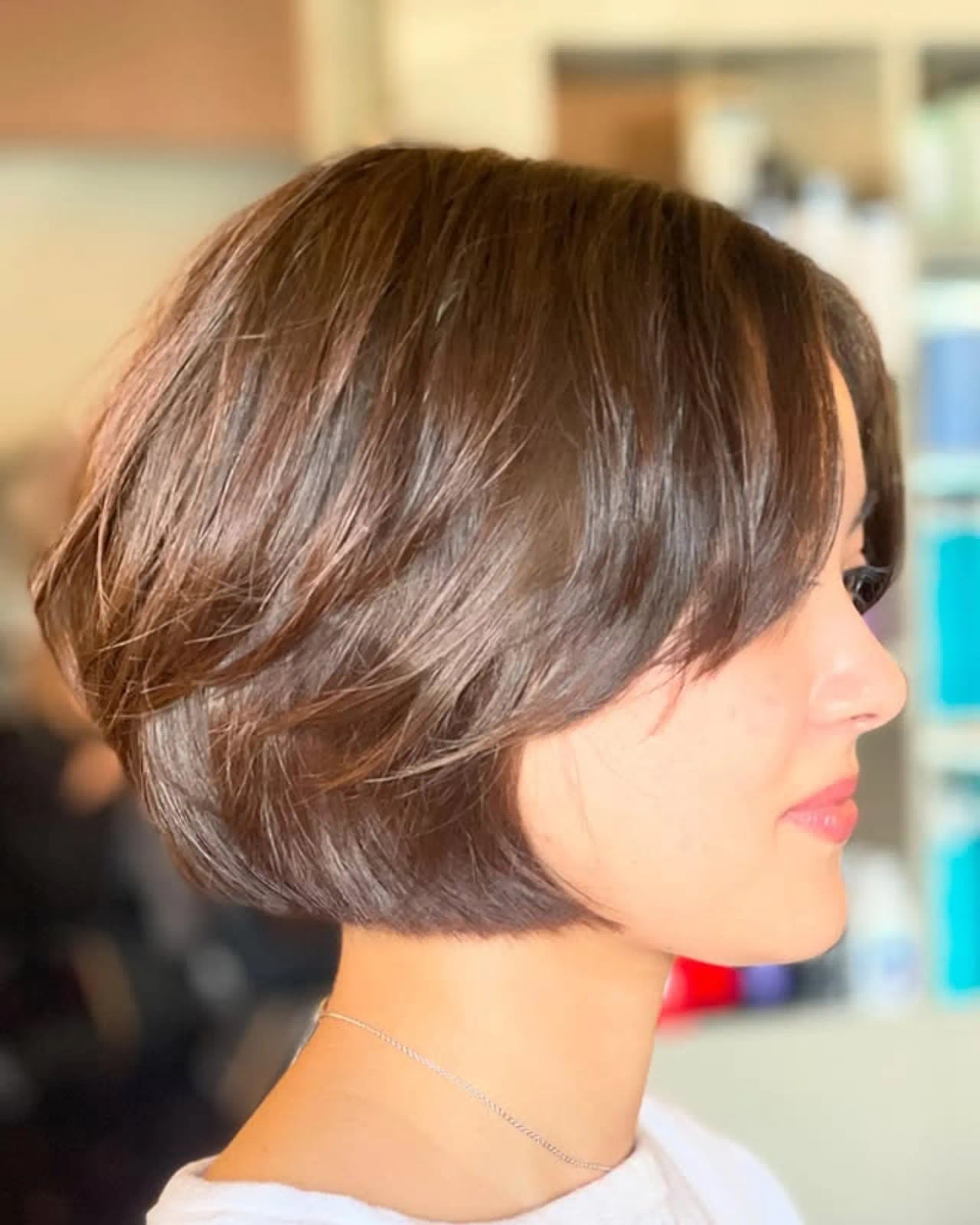 Chin Length Layered Bob With Dark Brown Hair — Bob with Curtain Bangs