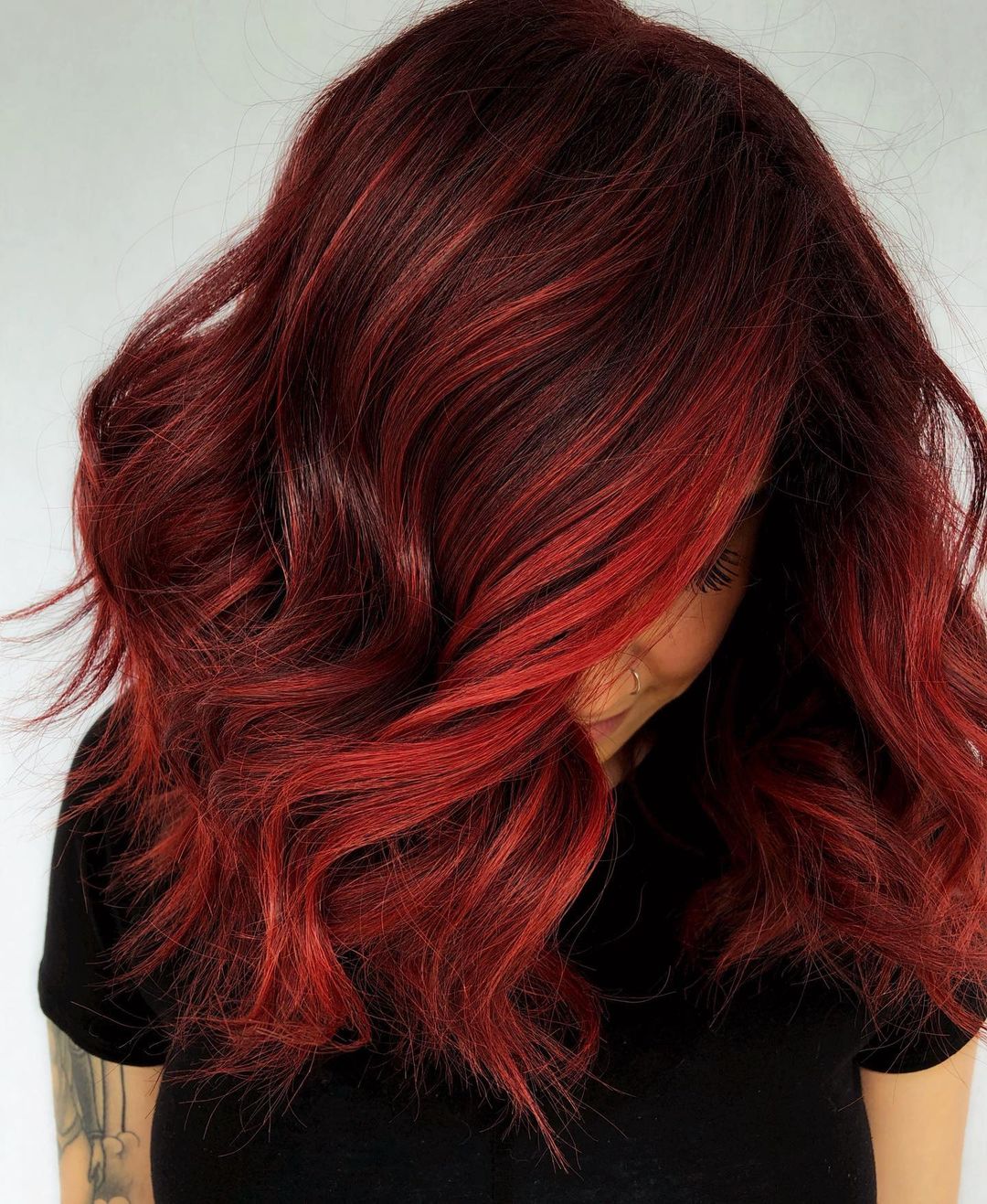 Deep Red Wavy Layers With Darker Undertones — Bright Red Hair
