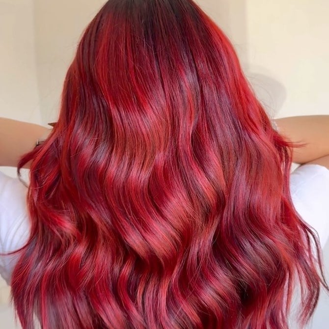 Vibrant Red Mid-Back Shag With Curtain Bangs — Bright Red Hair
