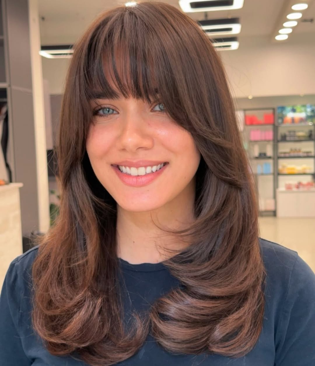 Mid-Back Layered Butterfly With Full Bangs — Butterfly Haircut