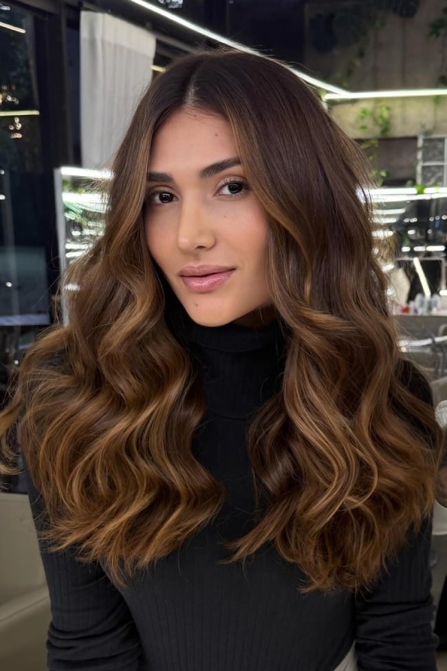 Mid-Back Brown With Caramel Balayage and Curtain Bangs