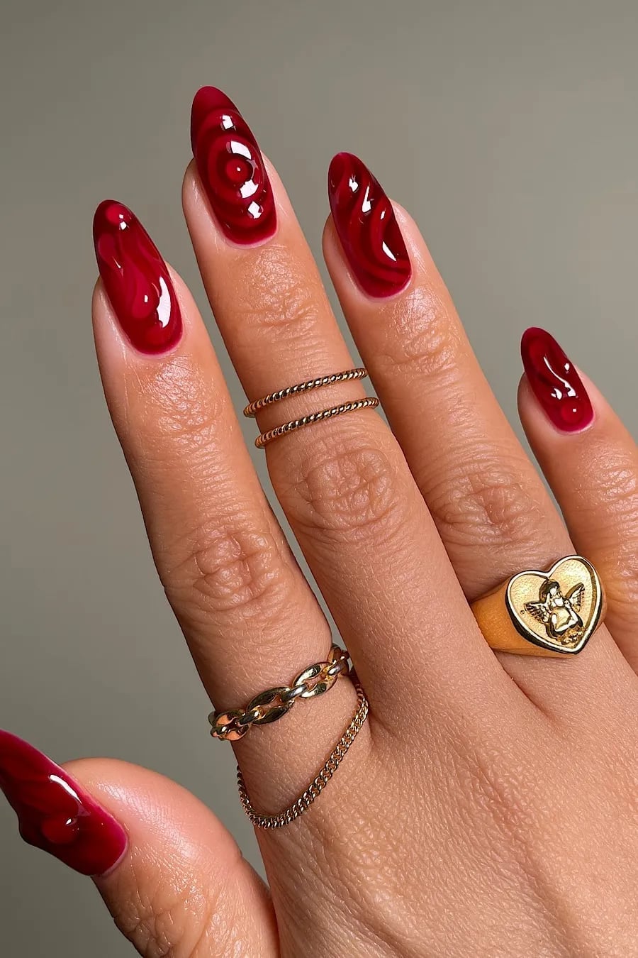 Medium Almond Nails With Deep Red Jelly Swirls — Cherry Red Nails