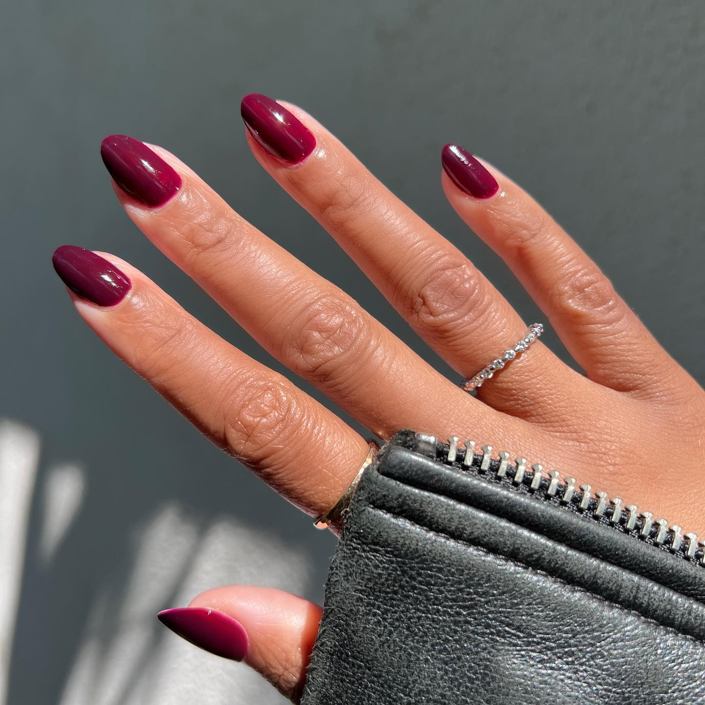 Medium Almond Nails With Cherry Red French Tips, Close-Up Take — Cherry Red Nails