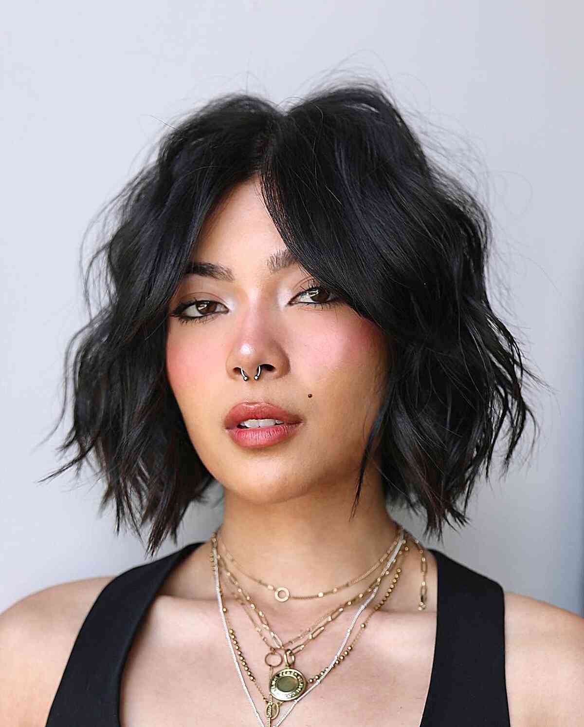 Black Wavy Bob With Micro Bangs And Choppy Layers Black Wavy Bob With Micro Bangs And Choppy Layers