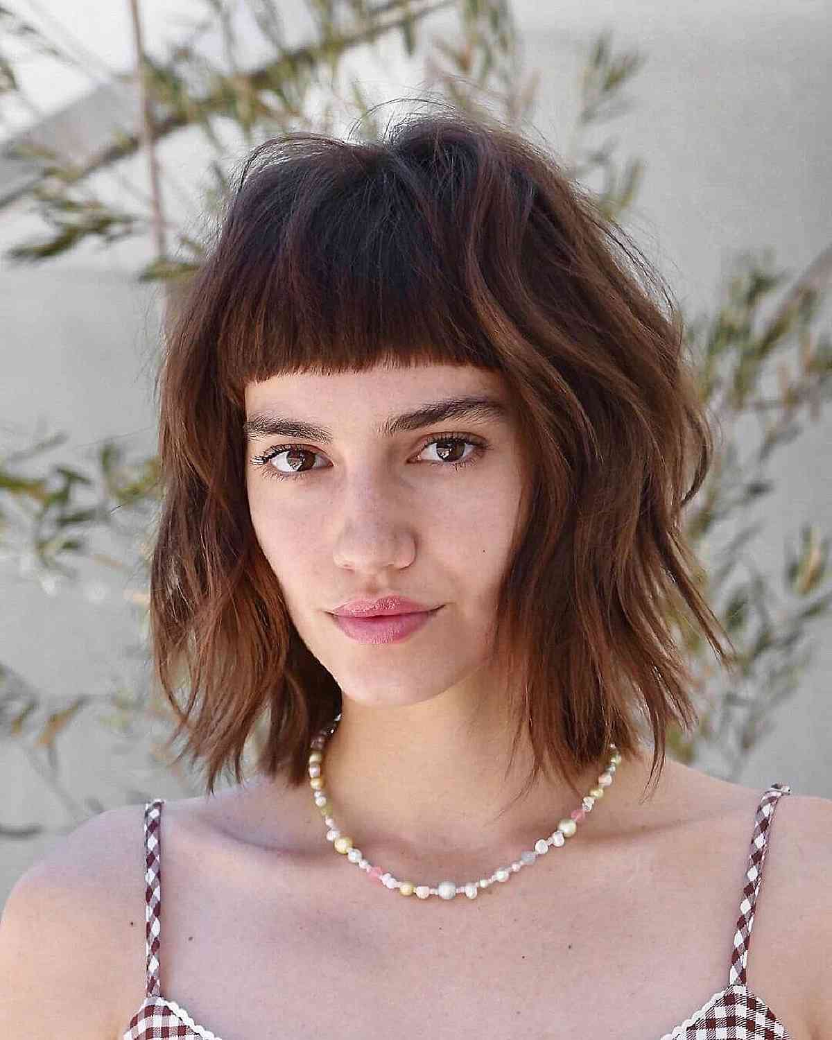 Dark Brown Wavy Bob With Micro Bangs And Choppy Layers Dark Brown Wavy Bob With Micro Bangs And Choppy Layers