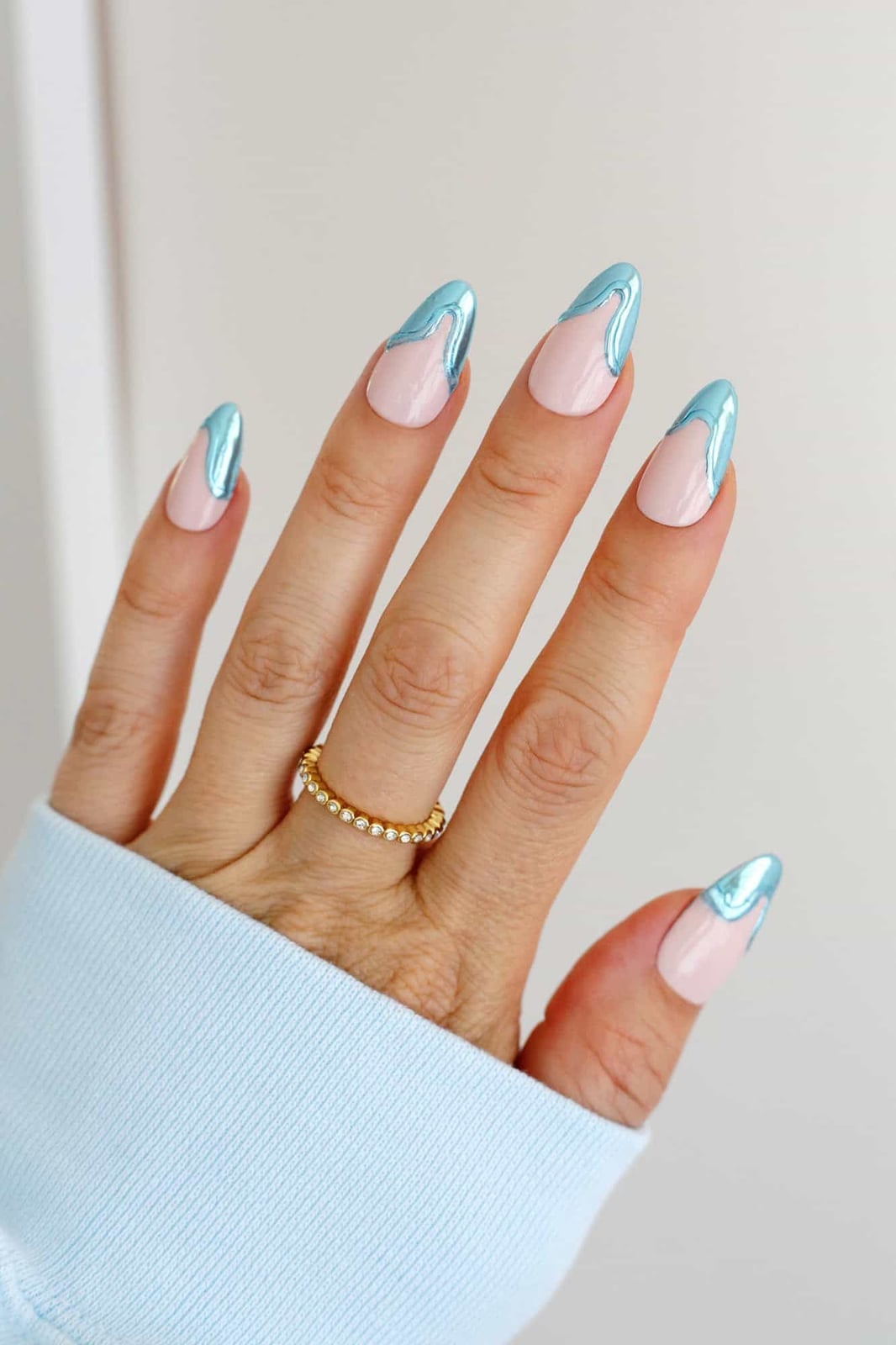 Nude Base Light Blue Chrome Wavy French Tip Almond Nails Nude Base Light Blue Chrome Wavy French Tip Almond Nails — Chrome Nails