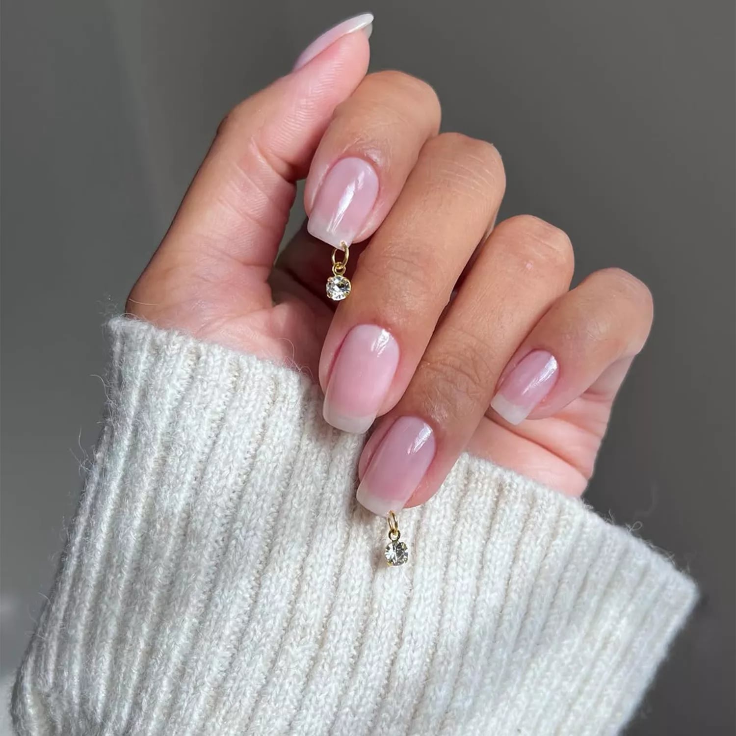 Sheer Pink French Tips With Charm Sheer Pink French Tips With Charm — Classy Short Nails